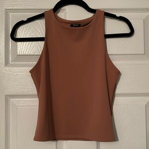 Express body contouring tank in a neutral/terracotta color